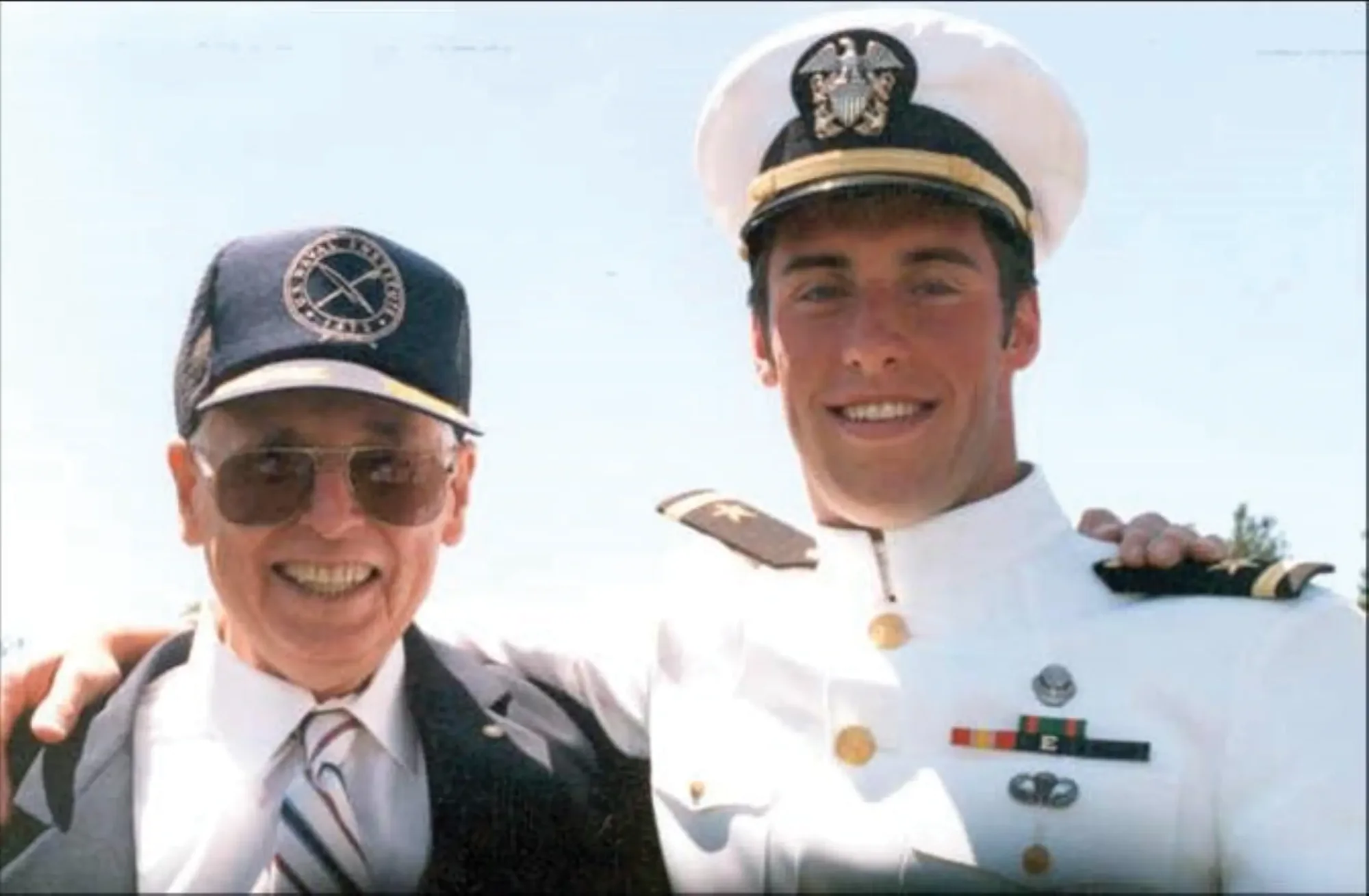 LT Michael McGreevy ’97, USN, with his grandfather James Mackin. McGreevy was one of 16 troops killed when their helicopter was shot down in 2005 in Afghanistan. The Annual Run for Our Heroes race in Portville, NY, benefits the Michael McGreevy Memorial Scholarship Foundation.